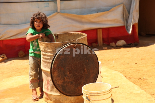 Child inside Qibb Ilyas refugee camp 