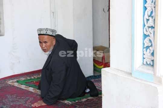 Chinese Muslim Uighur inside mosque 