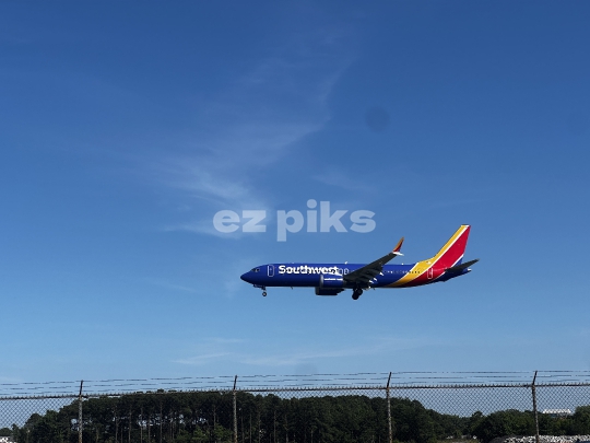 Norfolk, VA, USA- 06-16-2024 A Southwest Airlines Boeing 737 about to touch down in Norfolk airport in Virginia state, USA.
