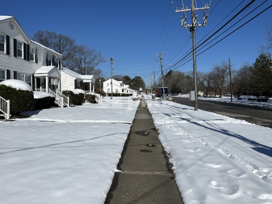 Snow Covered Sidewalk 
