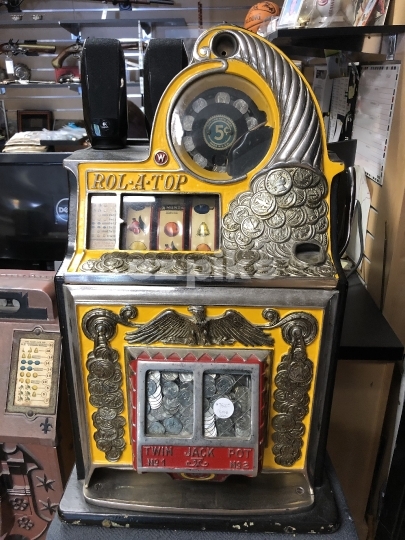 Vintage Rol-A-Top coin-