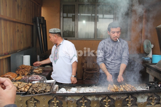 Xinjiang men at BBQ